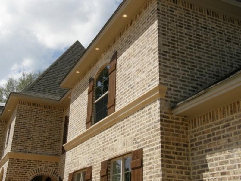 Cast Stone Banding on French Country Two Story Home